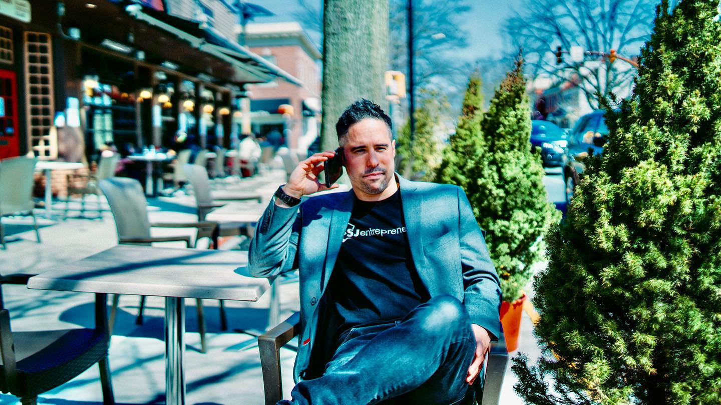 Matthew Auterson on the phone with a client
